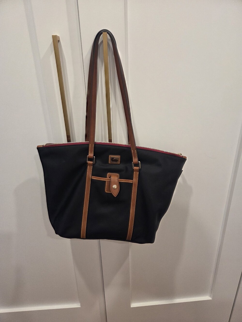 Like New Dooney & Bourke Black Tote with Brown Trim and Red Zipper Accent
